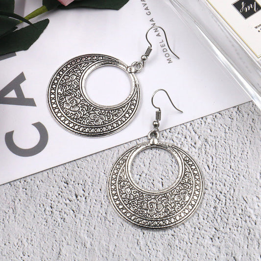 Round hollow vintage alloy earrings
