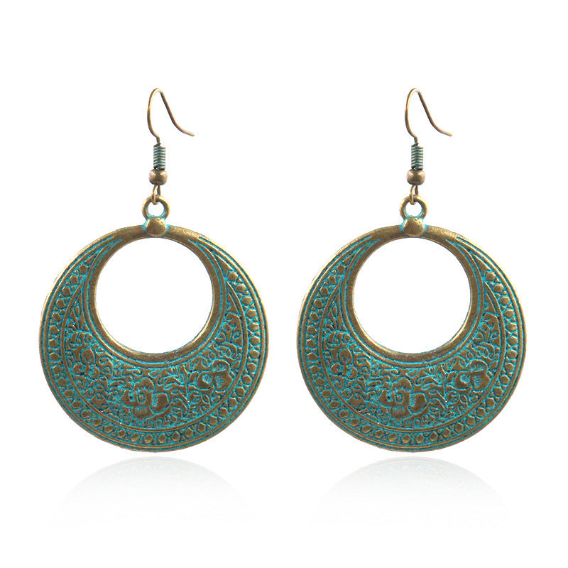 Round hollow vintage alloy earrings