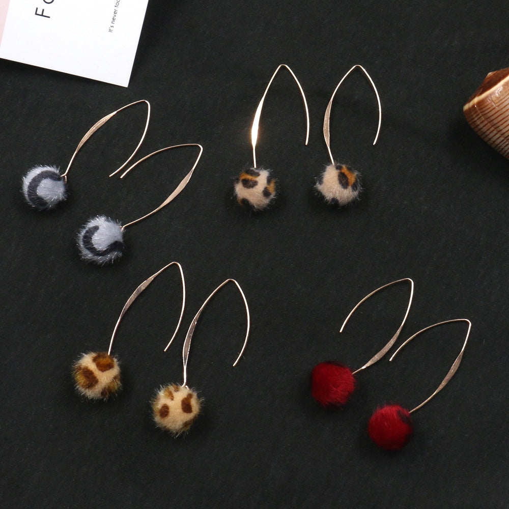 Leopard hair ball earrings