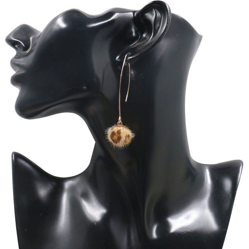 Leopard hair ball earrings