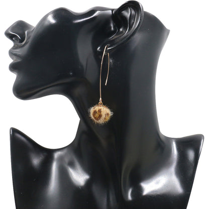 Leopard hair ball earrings