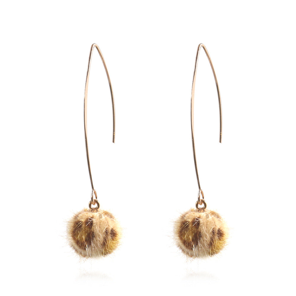 Leopard hair ball earrings