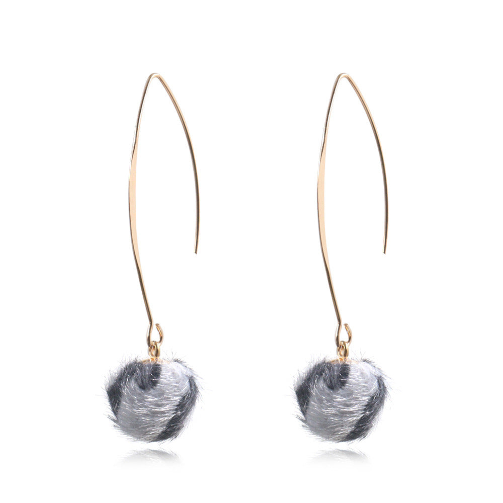 Leopard hair ball earrings