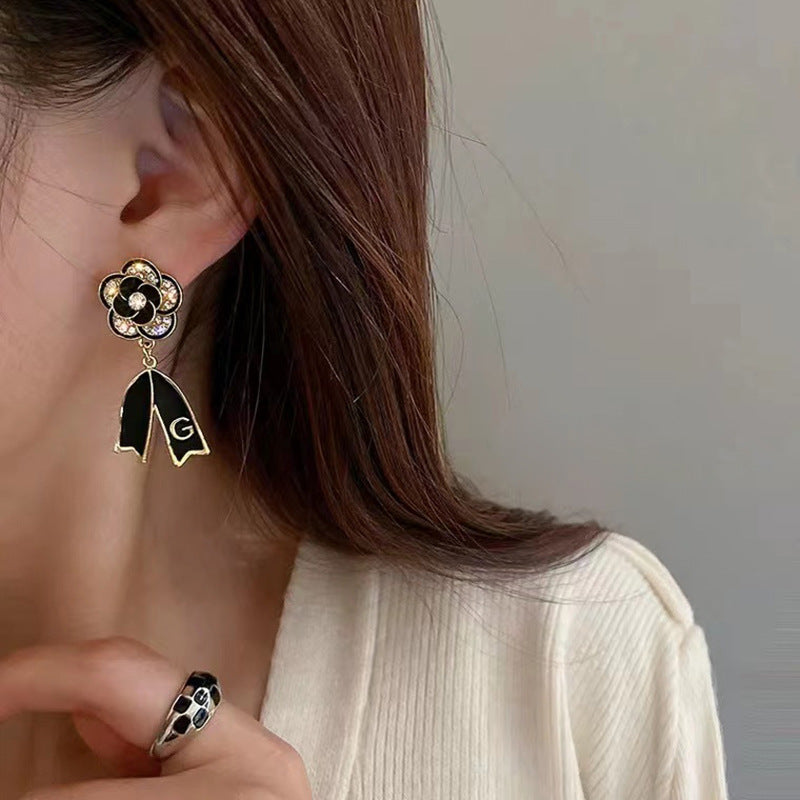 S925 silver pin black diamond-set lettering floral earrings