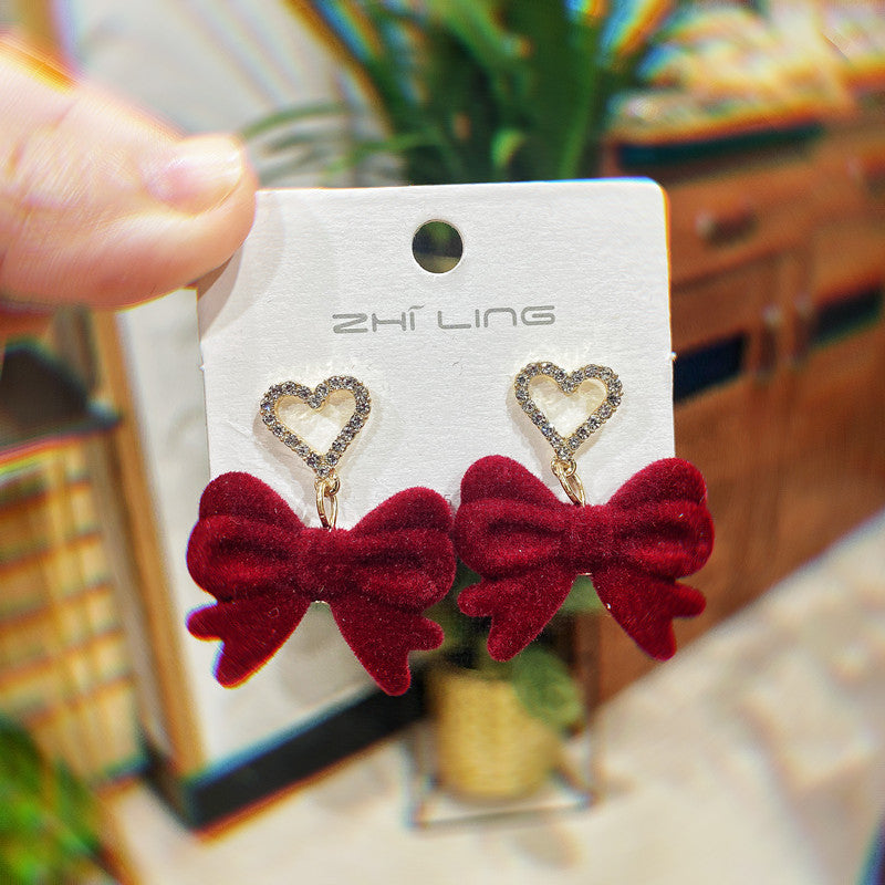 WHOLESALE red retro flocking bow tassel earrings