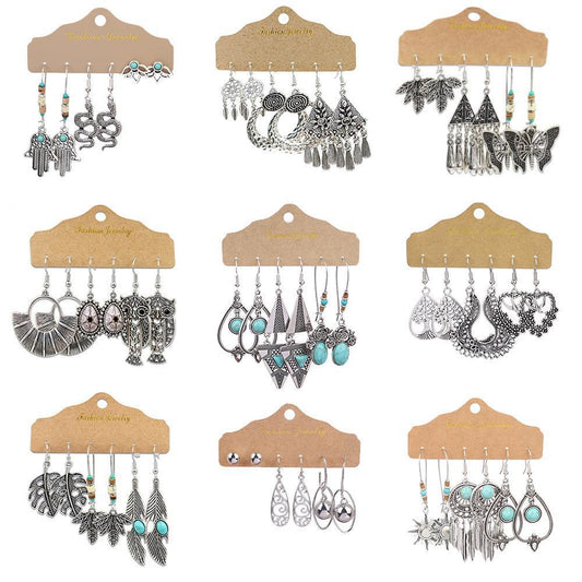 Irregular silver butterfly tassel earrings