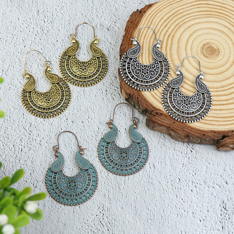 Retro geometric hollow flower alloy earrings