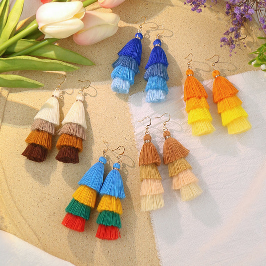 Long color matching multi-layer tassel earrings