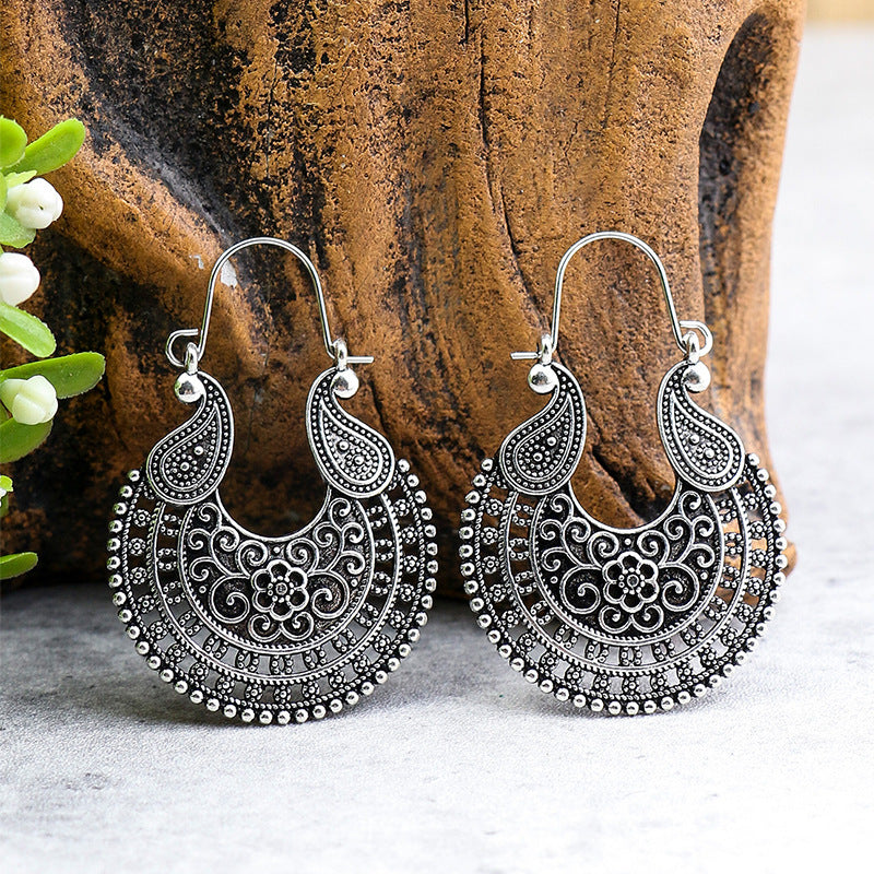 Retro geometric hollow flower alloy earrings