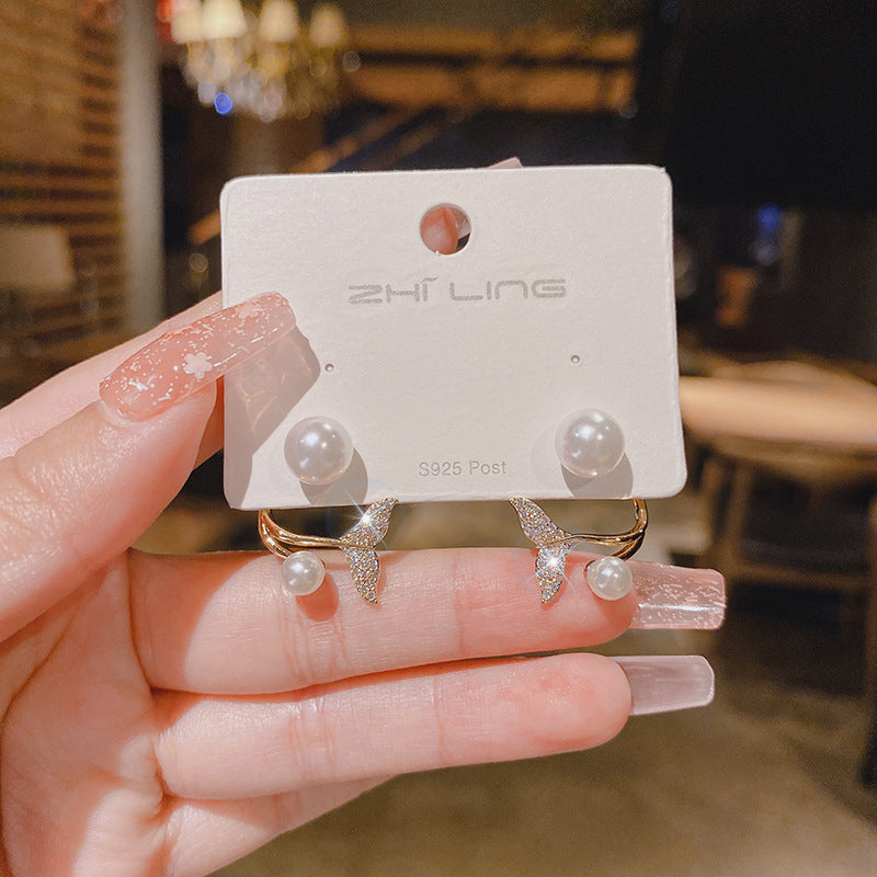 WHOLESALE fishtail pearl earrings