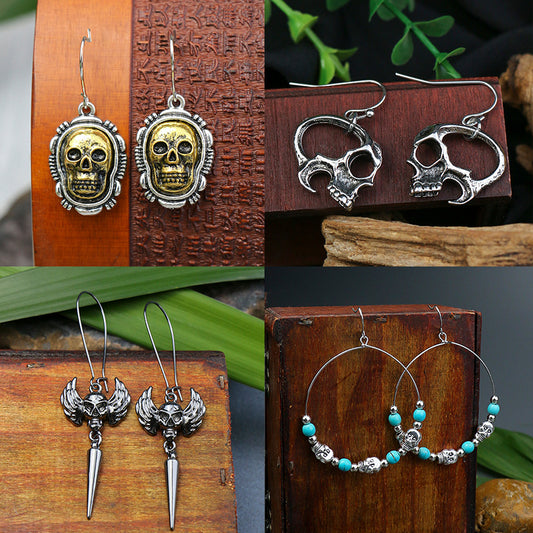 Horrible funny skull Halloween earrings