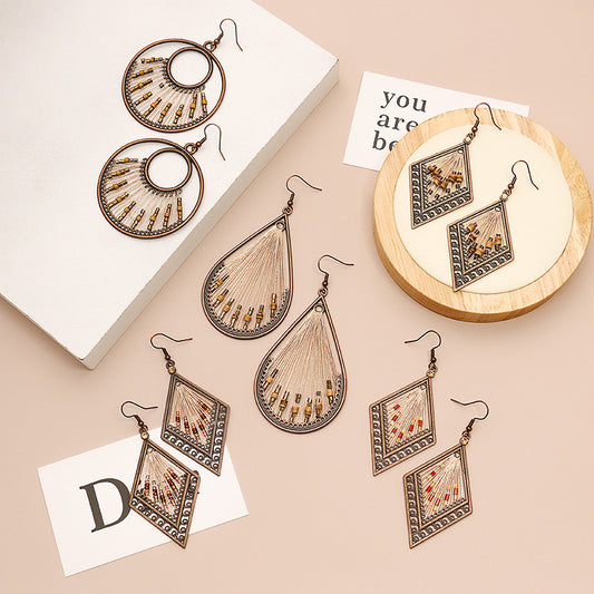 Fashion drop-shaped hand-woven retro earrings