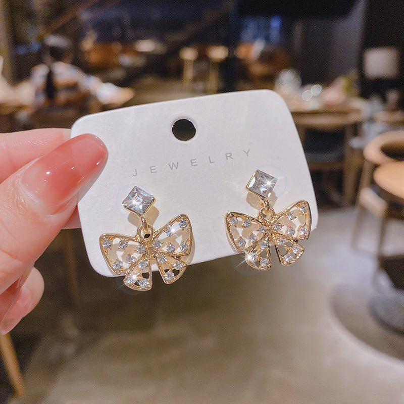 Wholesale S925 silver needle fashion exaggerated rhinestone compact butterfly earrings