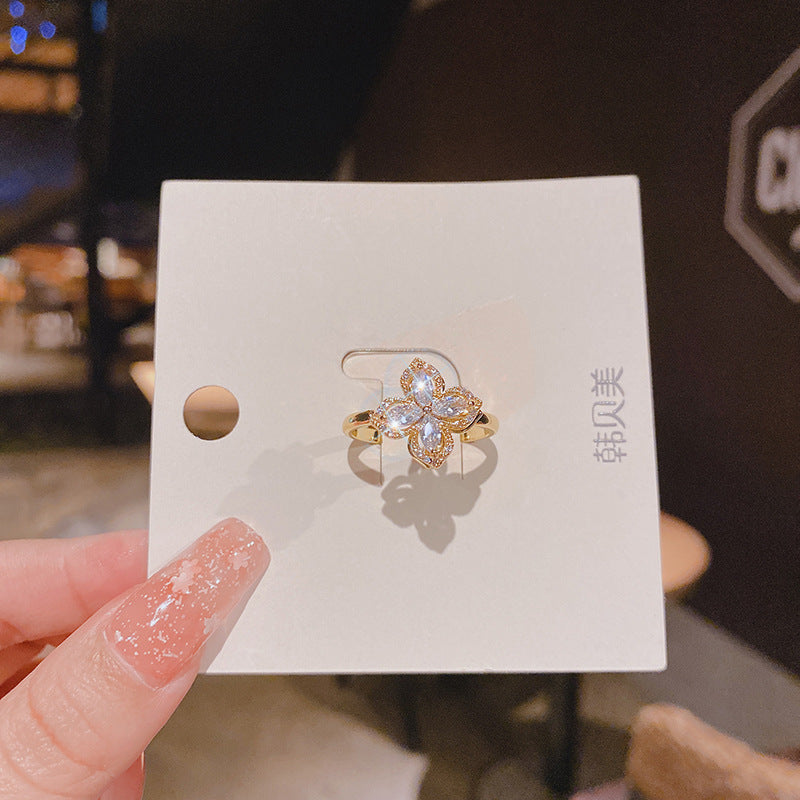 WHOLESALE rotating windmill ring inlaid with zircon