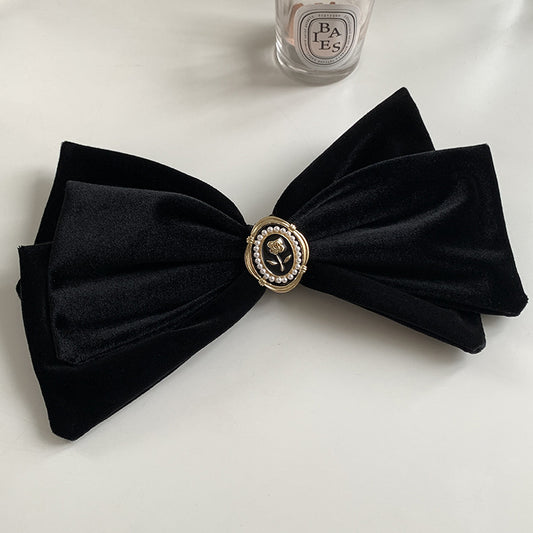 Black velvet bow hair clips