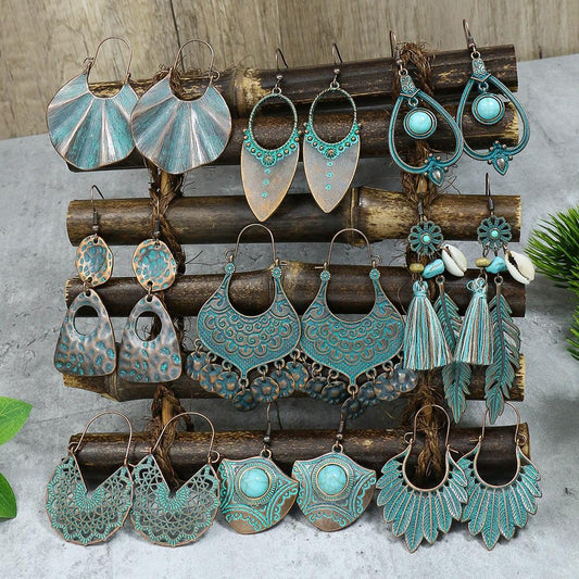 Irregular leaves hollowed out turquoise earrings