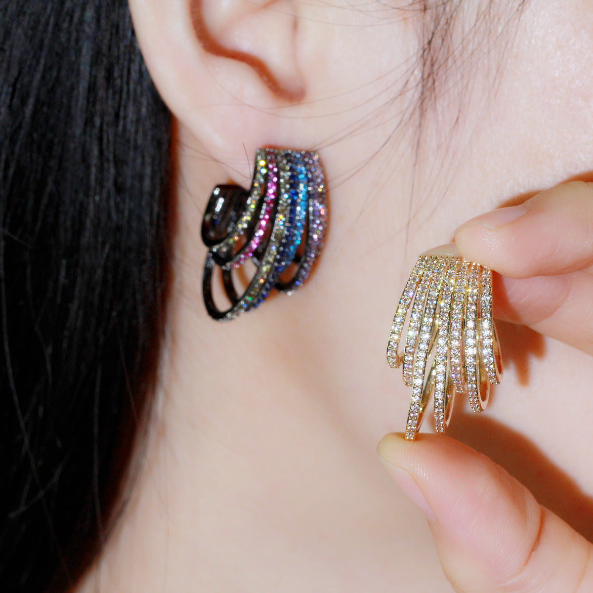 Skeleton black colored zircon earrings