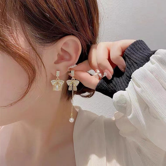 S925 Silver Needle Pearl tassel openwork asymmetric bow long earrings