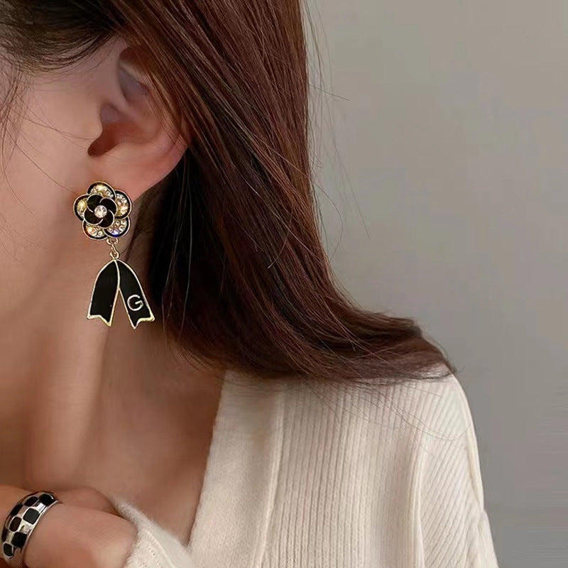 S925 silver pin black diamond-set lettering floral earrings