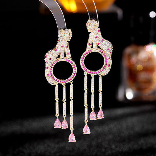 Fringed circle leopard earrings