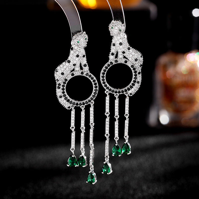 Fringed circle leopard earrings