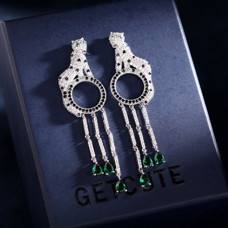 Fringed circle leopard earrings