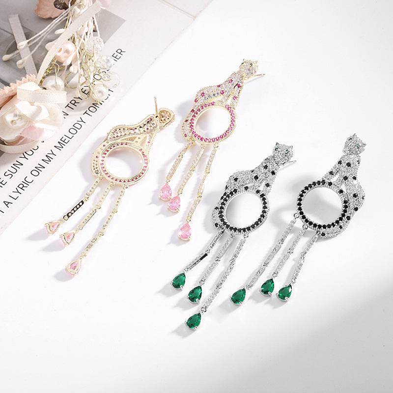 Fringed circle leopard earrings