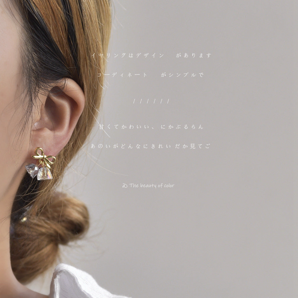 WHOLESALE retro clear bow sweet temperament earrings