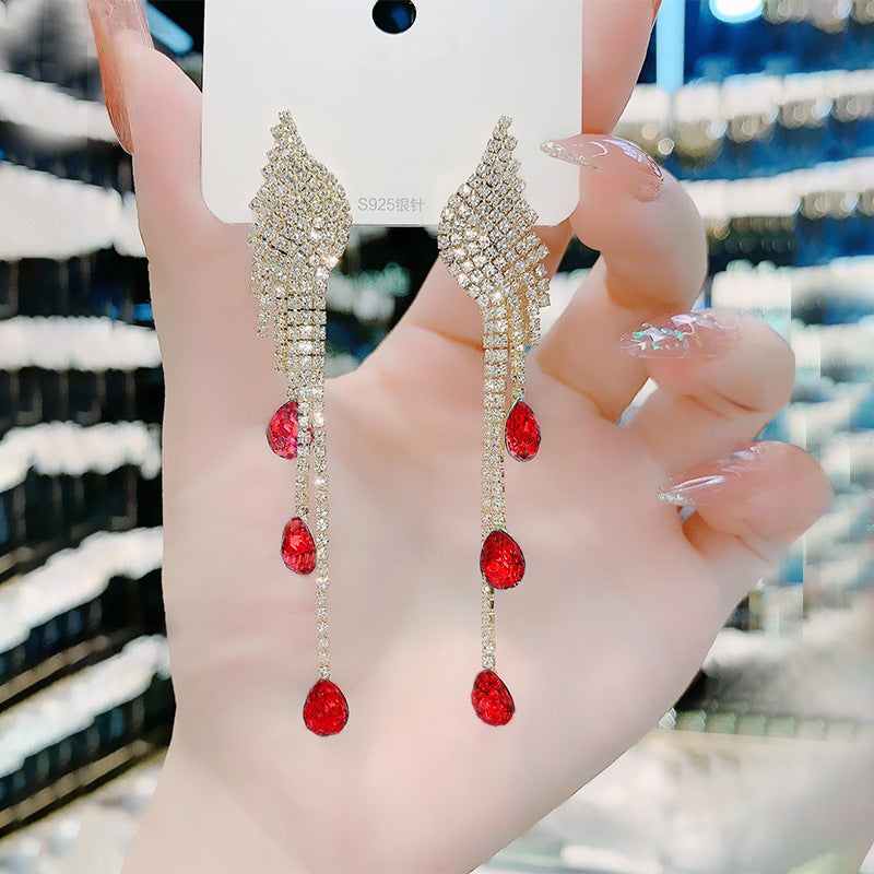 Full rhinestone long wing earrings