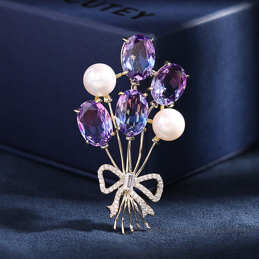 Zircon crystal brooch bow brooch