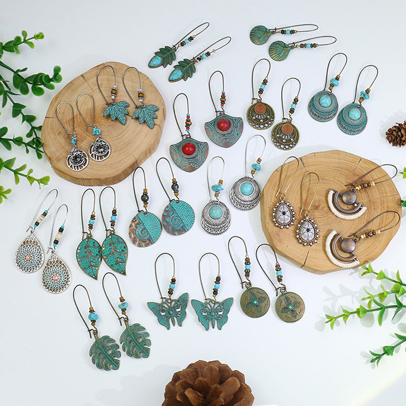 Alloy earrings openwork leaf turquoise earrings