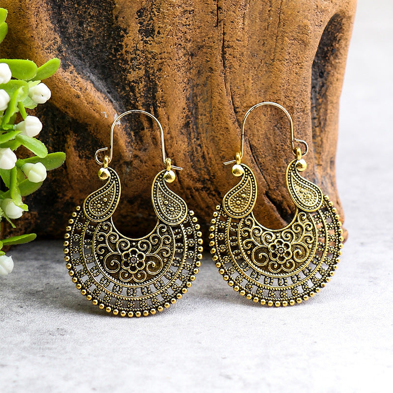 Retro geometric hollow flower alloy earrings