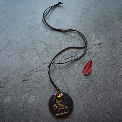 Wood Chip Bird And Cage Pendant Long Necklace