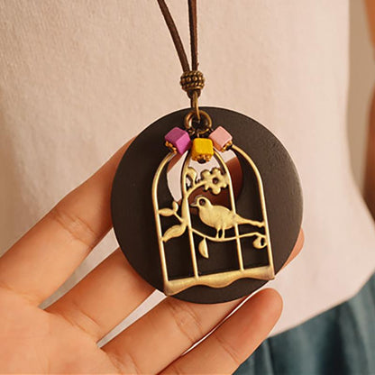 Wood Chip Bird And Cage Pendant Long Necklace