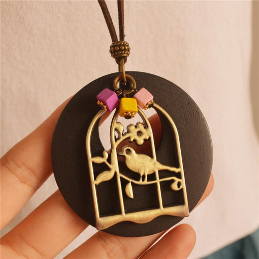 Wood Chip Bird And Cage Pendant Long Necklace