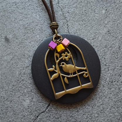 Wood Chip Bird And Cage Pendant Long Necklace
