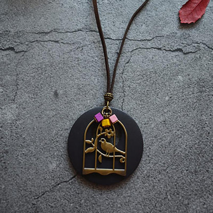 Wood Chip Bird And Cage Pendant Long Necklace