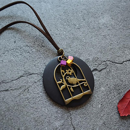 Wood Chip Bird And Cage Pendant Long Necklace